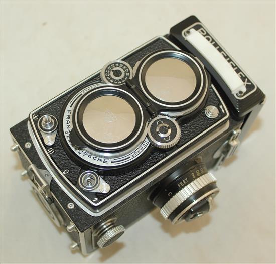 A Rolleiflex 3.5 Planar Xenotar camera and instruction book